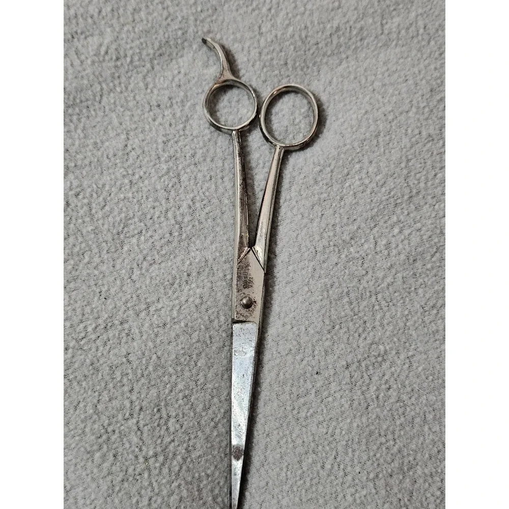 vintage silver metal hair scissors manufactured by Griffon in Germany collect